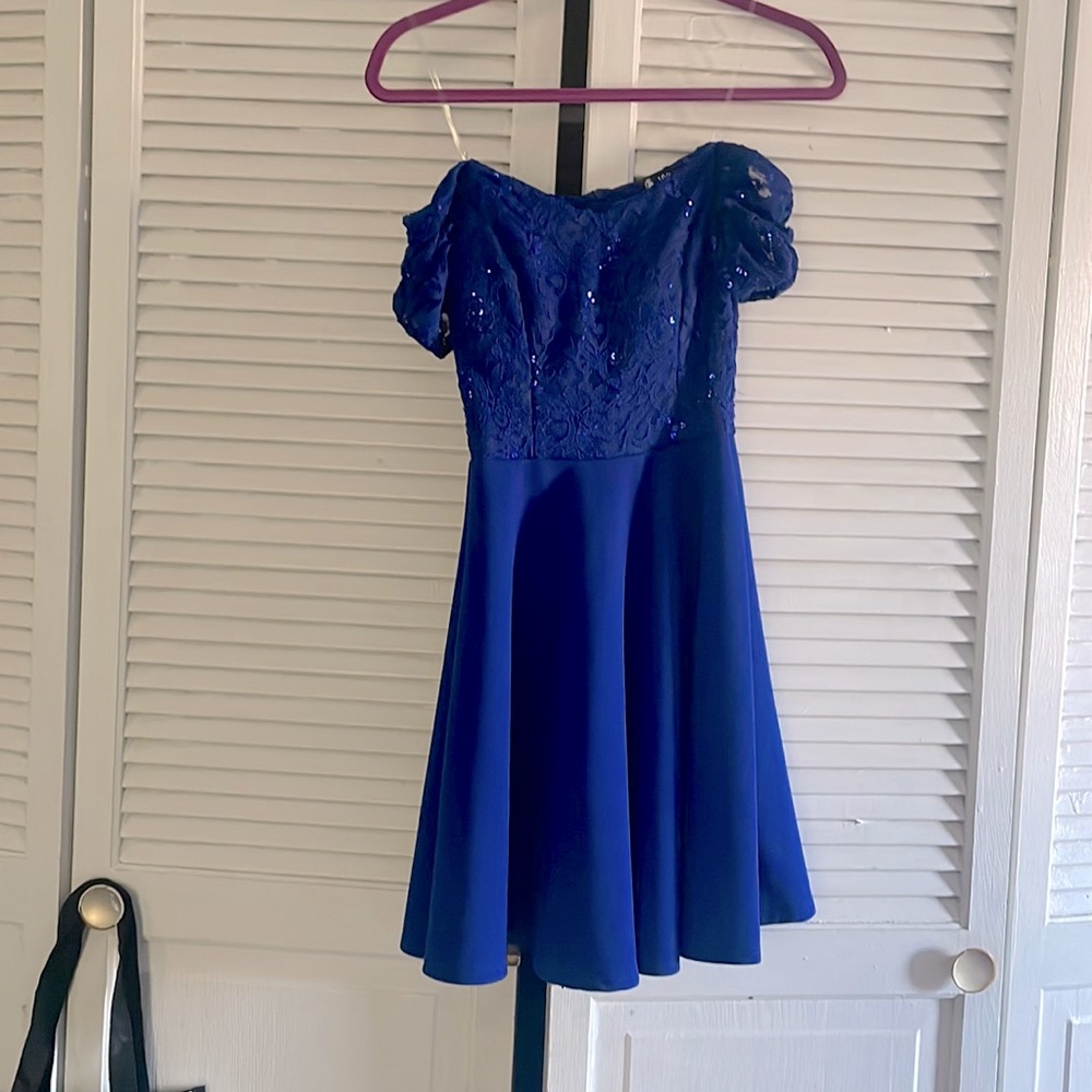 La Scala short, off the shoulder dress. Blue with lace and sequence on top.